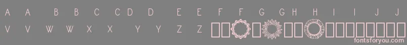 Monogram Framer Demo-fontti – vaaleanpunaiset fontit harmaalla taustalla