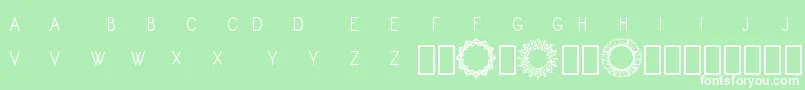 Czcionka Monogram Framer Demo – białe czcionki na zielonym tle