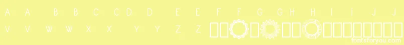 Шрифт Monogram Framer Demo – белые шрифты на жёлтом фоне