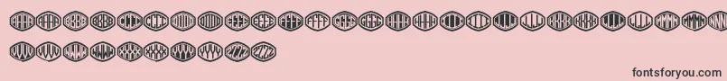 Monogramus-fontti – mustat fontit vaaleanpunaisella taustalla