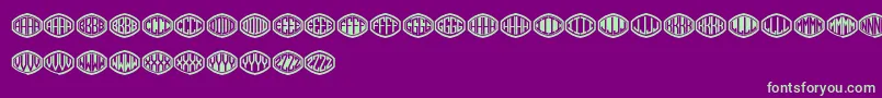 フォントMonogramus – 紫の背景に緑のフォント
