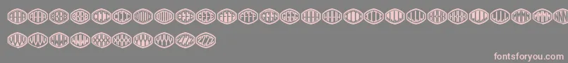 Czcionka Monogramus – różowe czcionki na szarym tle