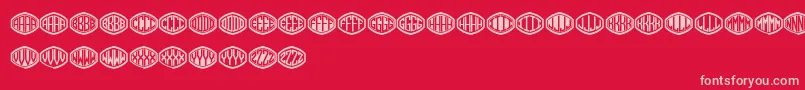 Czcionka Monogramus – różowe czcionki na czerwonym tle