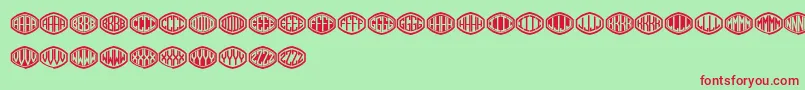 Czcionka Monogramus – czerwone czcionki na zielonym tle