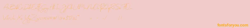 フォントMonoline – オレンジの文字がピンクの背景にあります。