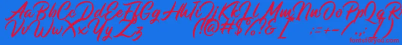 Monopola Script DEMO Font – Red Fonts on Blue Background