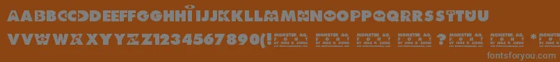 Monster AG Font – Gray Fonts on Brown Background