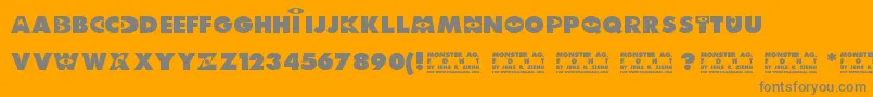 Monster AG-Schriftart – Graue Schriften auf orangefarbenem Hintergrund