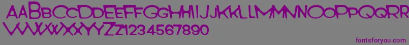 Шрифт Monster World – фиолетовые шрифты на сером фоне