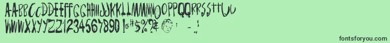 Monsterchild Font – Black Fonts on Green Background