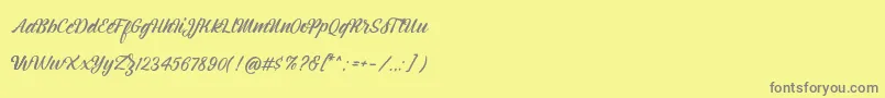 Montagne Script Free Demo Font – Gray Fonts on Yellow Background