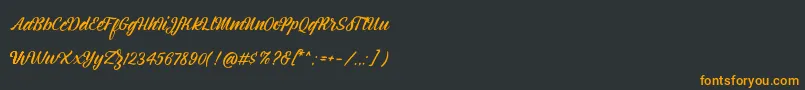 Шрифт Montagne Script Free Demo – оранжевые шрифты на чёрном фоне