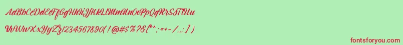 Шрифт Montagne Script Free Demo – красные шрифты на зелёном фоне