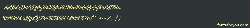 Шрифт Montagne Script Free Demo – жёлтые шрифты на чёрном фоне
