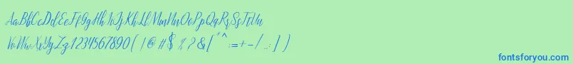 montalia script Font – Blue Fonts on Green Background