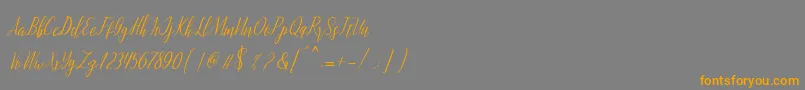 montalia script-fontti – oranssit fontit harmaalla taustalla