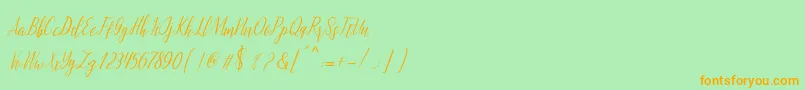 montalia script-fontti – oranssit fontit vihreällä taustalla