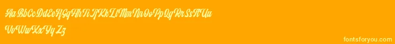Шрифт Monthelo – жёлтые шрифты на оранжевом фоне