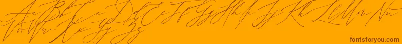 MonthGlade-Schriftart – Braune Schriften auf orangefarbenem Hintergrund