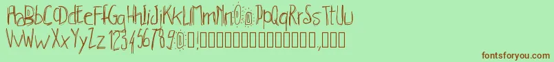 Pwhachures Font – Brown Fonts on Green Background