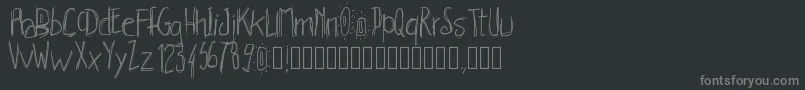 フォントPwhachures – 黒い背景に灰色の文字