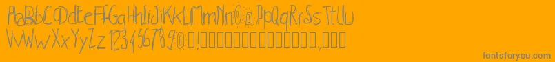 Pwhachures-Schriftart – Graue Schriften auf orangefarbenem Hintergrund