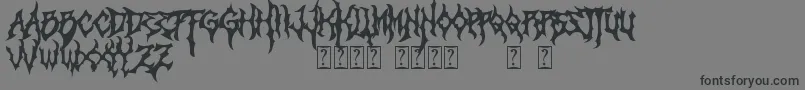フォントMonumental – 黒い文字の灰色の背景