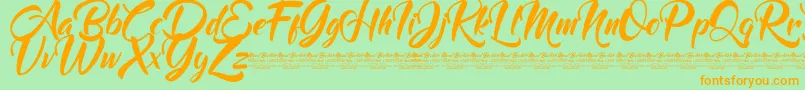 フォントMood Booster Demo – オレンジの文字が緑の背景にあります。