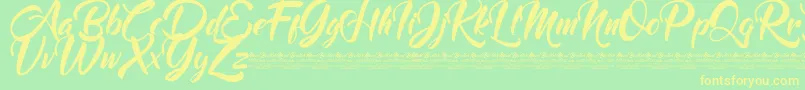 フォントMood Booster Demo – 黄色の文字が緑の背景にあります