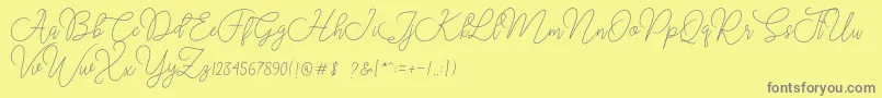 フォントMoon Chin – 黄色の背景に灰色の文字