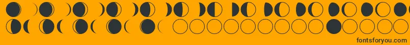 Шрифт moon phases – чёрные шрифты на оранжевом фоне