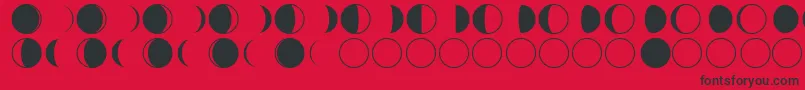 フォントmoon phases – 赤い背景に黒い文字