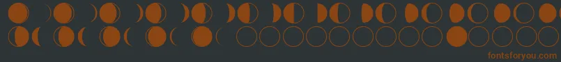 moon phases-fontti – ruskeat fontit mustalla taustalla