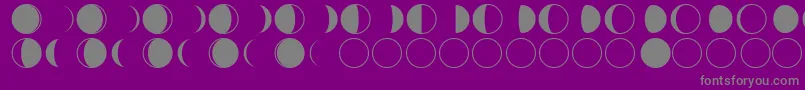 フォントmoon phases – 紫の背景に灰色の文字