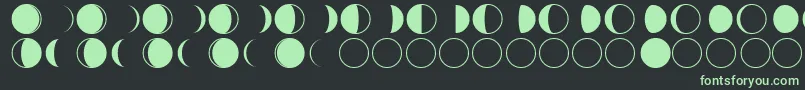 フォントmoon phases – 黒い背景に緑の文字