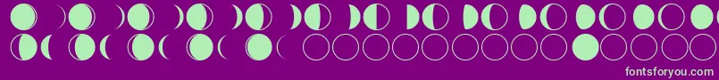 フォントmoon phases – 紫の背景に緑のフォント