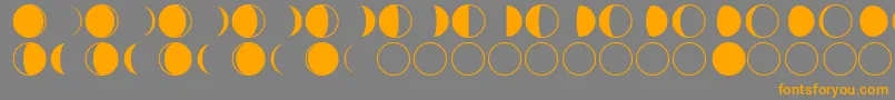 フォントmoon phases – オレンジの文字は灰色の背景にあります。