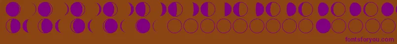 フォントmoon phases – 紫色のフォント、茶色の背景