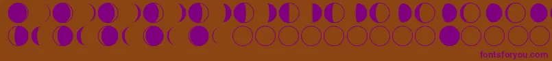 moon phases Font – Purple Fonts on Brown Background