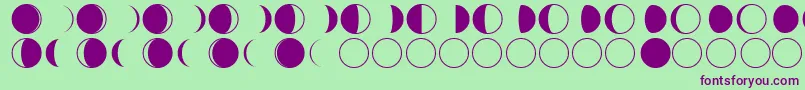 フォントmoon phases – 緑の背景に紫のフォント