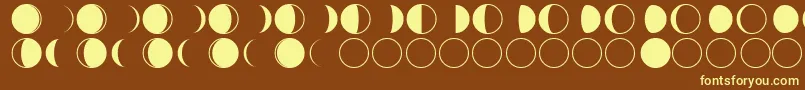 moon phases-fontti – keltaiset fontit ruskealla taustalla