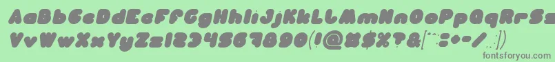 Fonte MOONLIGHT Italic – fontes cinzas em um fundo verde