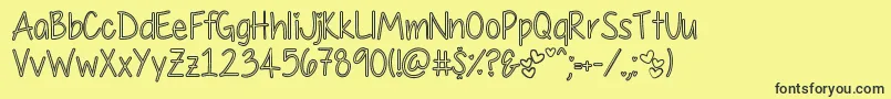 MyFirstCrushHollow Font – Black Fonts on Yellow Background