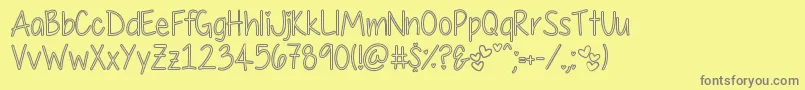 MyFirstCrushHollow Font – Gray Fonts on Yellow Background