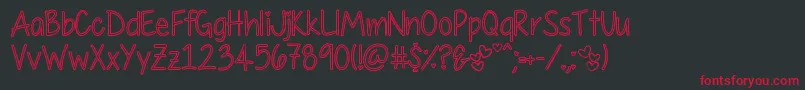 MyFirstCrushHollow Font – Red Fonts on Black Background