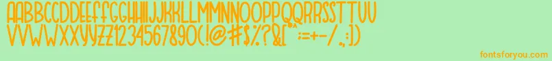 MOQA FLOAT-Schriftart – Orangefarbene Schriften auf grünem Hintergrund