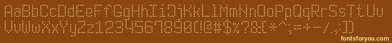 ModernDotDigital7-fontti – keltaiset fontit ruskealla taustalla