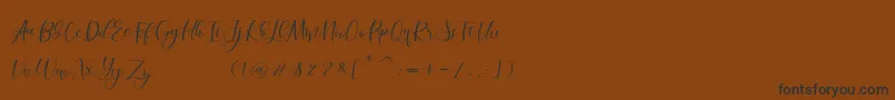 morelight-Schriftart – Schwarze Schriften auf braunem Hintergrund