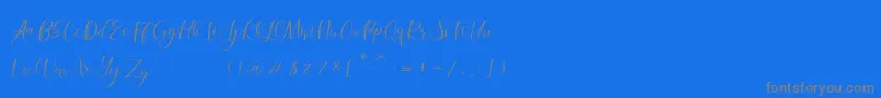 フォントmorelight – 青い背景に灰色の文字