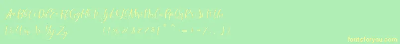 フォントmorelight – 黄色の文字が緑の背景にあります